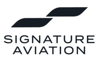 A sleek aircraft parked at Signature Aviation, showcasing a modern design against a clear blue sky.