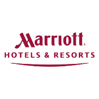 A modern hotel lobby featuring stylish furniture and elegant decor, showcasing the Marriott brand's welcoming atmosphere.