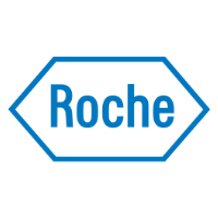 A professional team from Roche collaborating on a project, showcasing teamwork and innovation in a corporate setting.