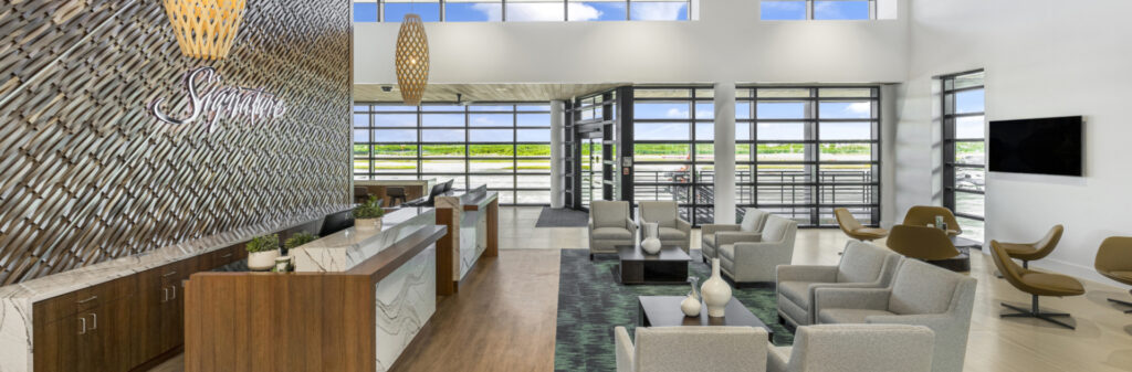 Renovated hangar office at Key West International Airport featuring modern architecture and large windows.