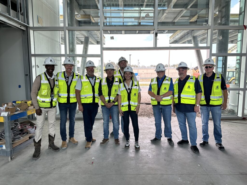 A construction site showcasing workers and machinery, highlighting construction management services USA in action.
